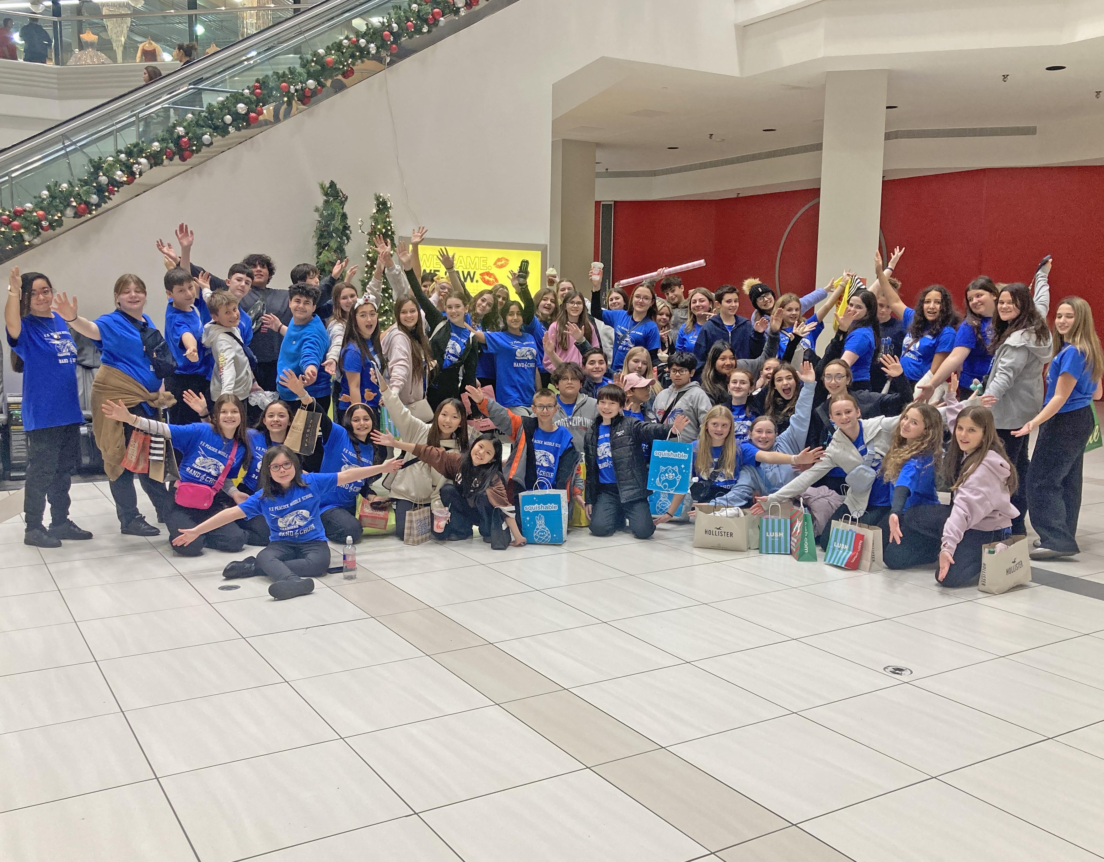 choir students posing for a photo at woodfield mall
