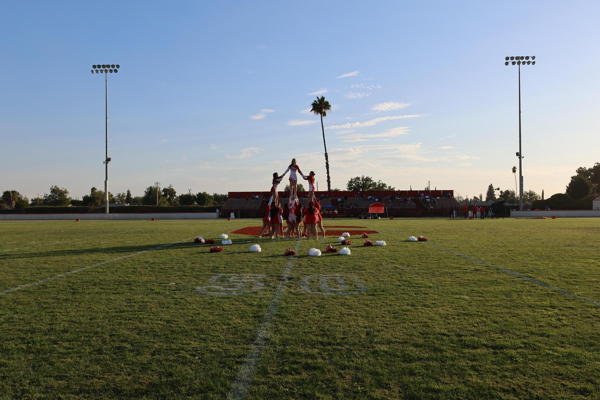 Junior Varsity Cheerleaders in action at halftime 9