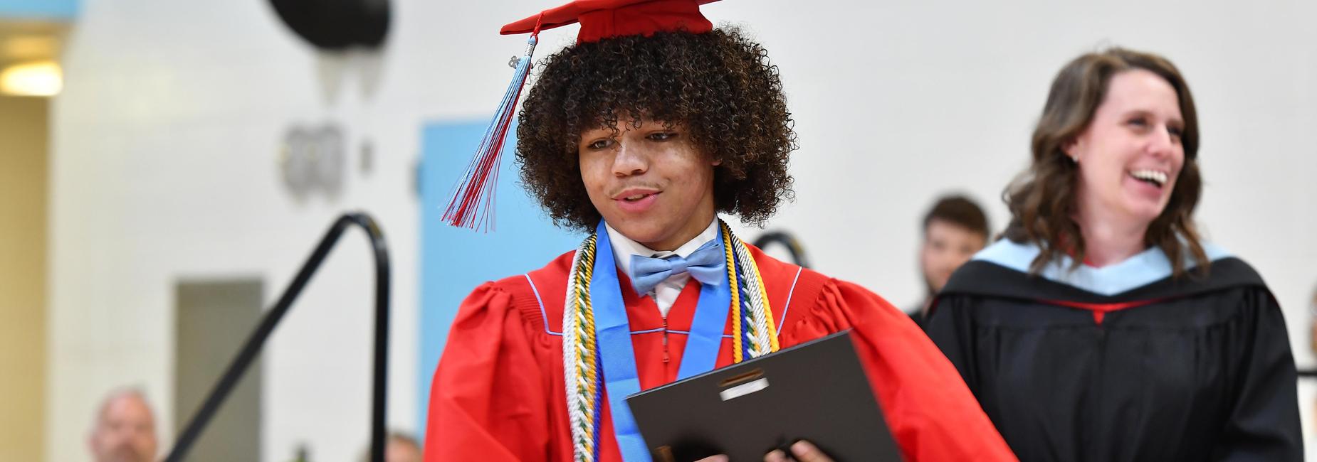 Student graduating with honors.