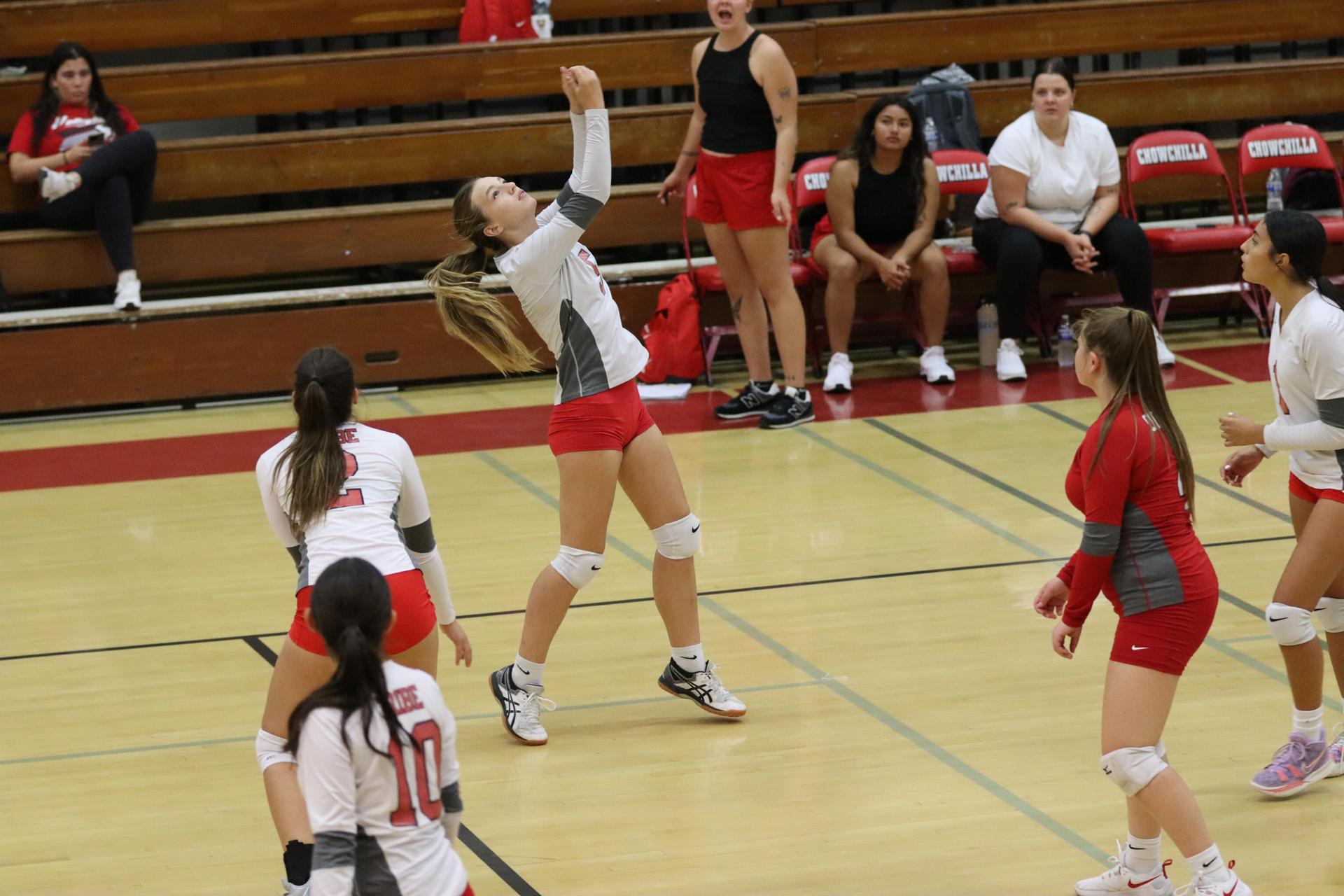 junior varsity girls playing volleyball against Liberty