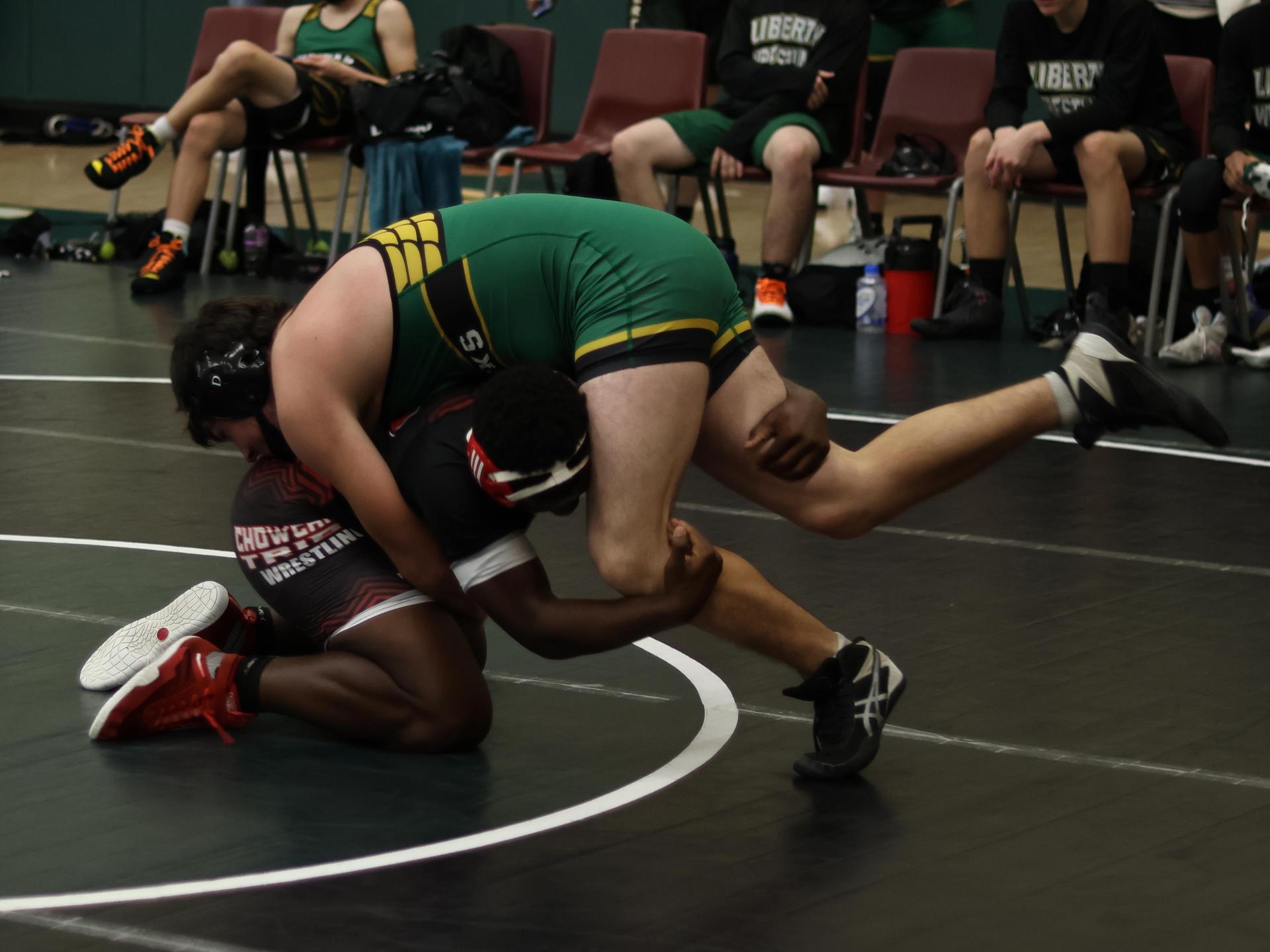 boys wrestling at liberty duals