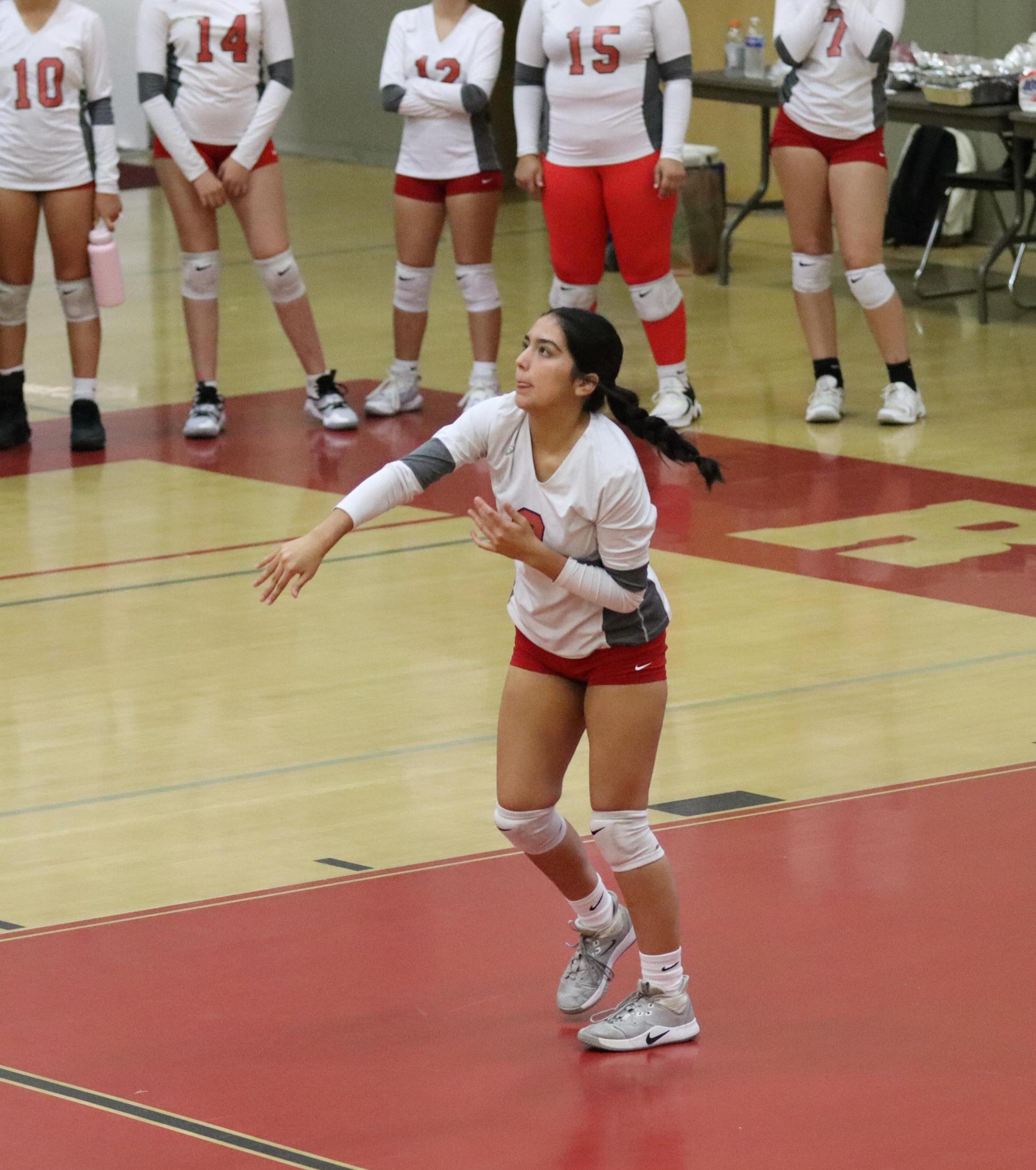 junior varsity girls playing volleyball against Liberty