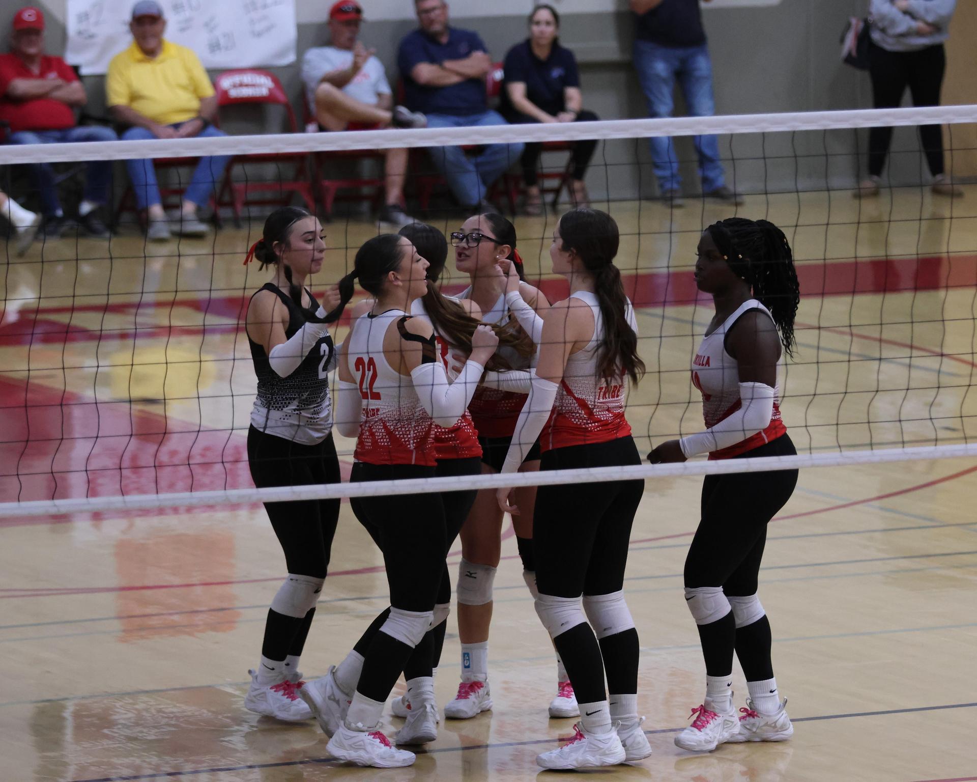 Varsity Volleyball playing vs. Fresno Christian 62