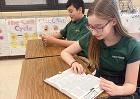 Students studying during religion class