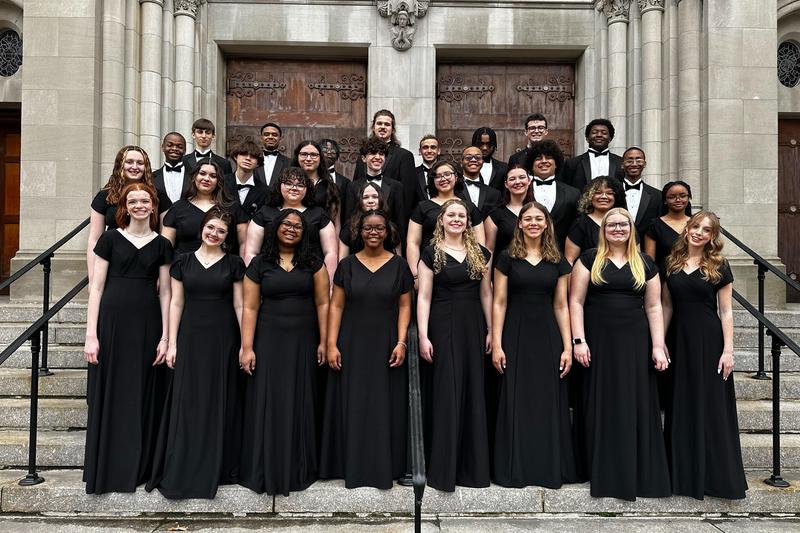 PGHS' choral ensemble stands on the steps of the historic Riverside Church in New York City.