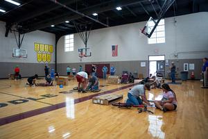 Students prepare to build bikes at Wrenches to Wheels