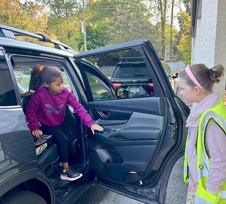 James River Day School's fourth-grade school patrols helps with morning carpool