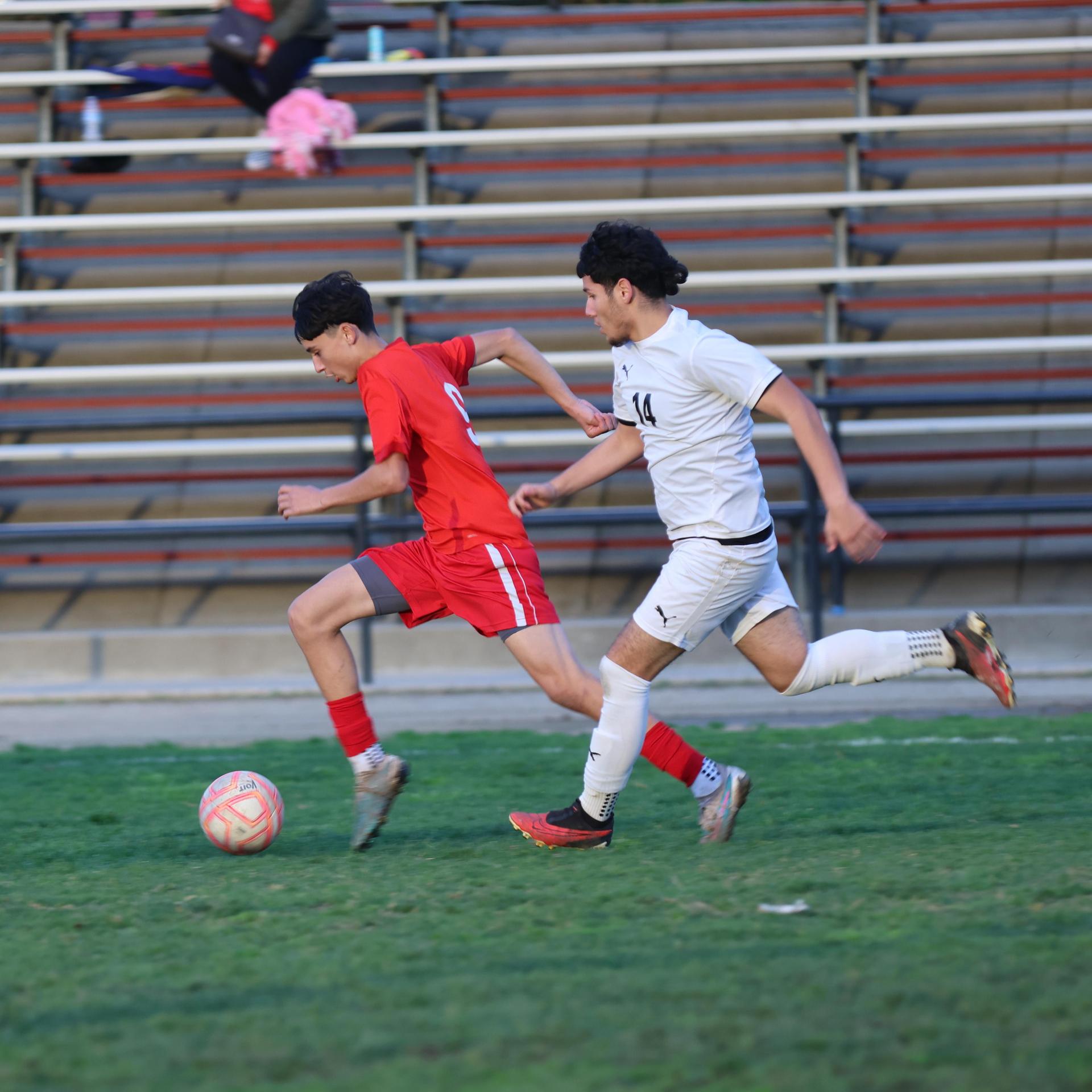 junior varsity boys playing soccer against washington union
