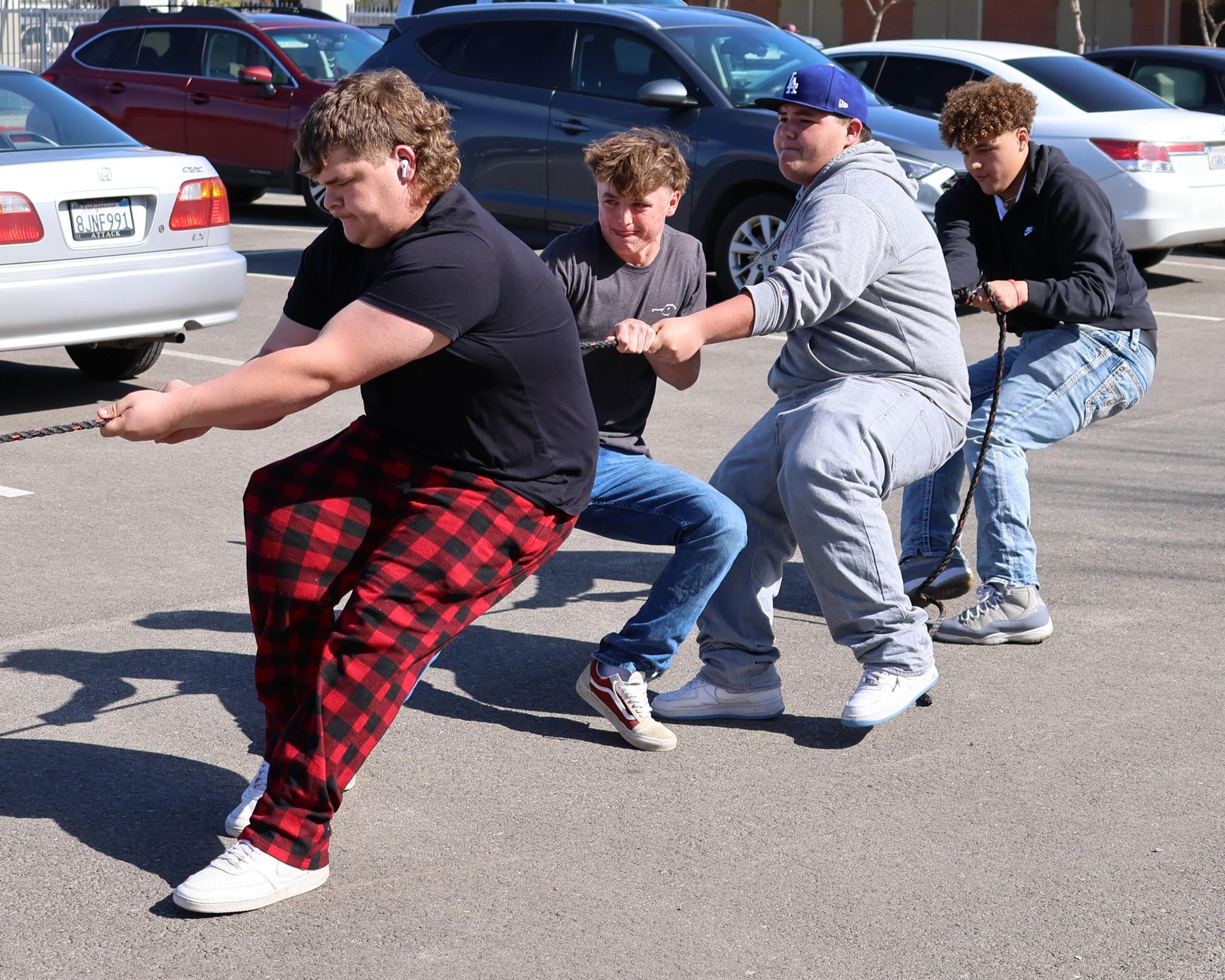 students and staff enjoying the truck pull
