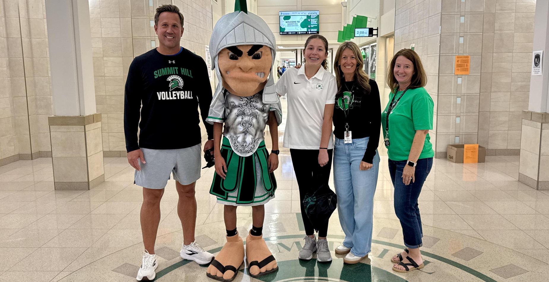 Golf state qualifier with coaches and Sparty