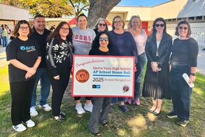 AP teaching staff pose with Assistant Principal Norma Cervantes, 2026.