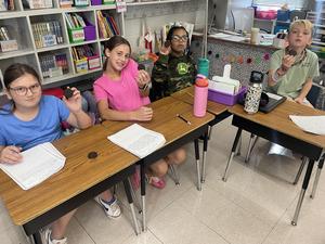Mrs. Roe's fourth graders reviewed opinion writing by participating in OREO writing today! Their prompt was “Should girls be allowed to play football?” Of course, they ended with a little snack!