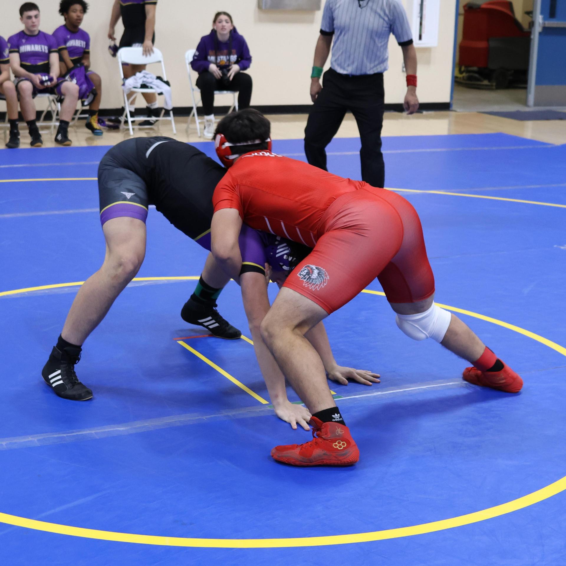 wrestlers in action at parlier