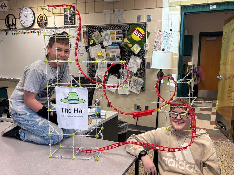 Two TK Middle School students build their roller coaster called 