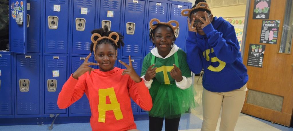 3 students costumed as "The Chipmunks"