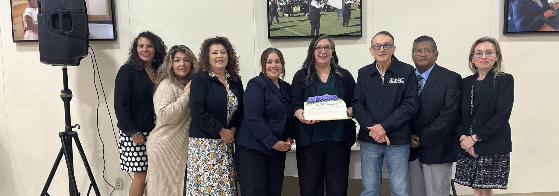 Superintendent Monica Anzo with cabinet and board members