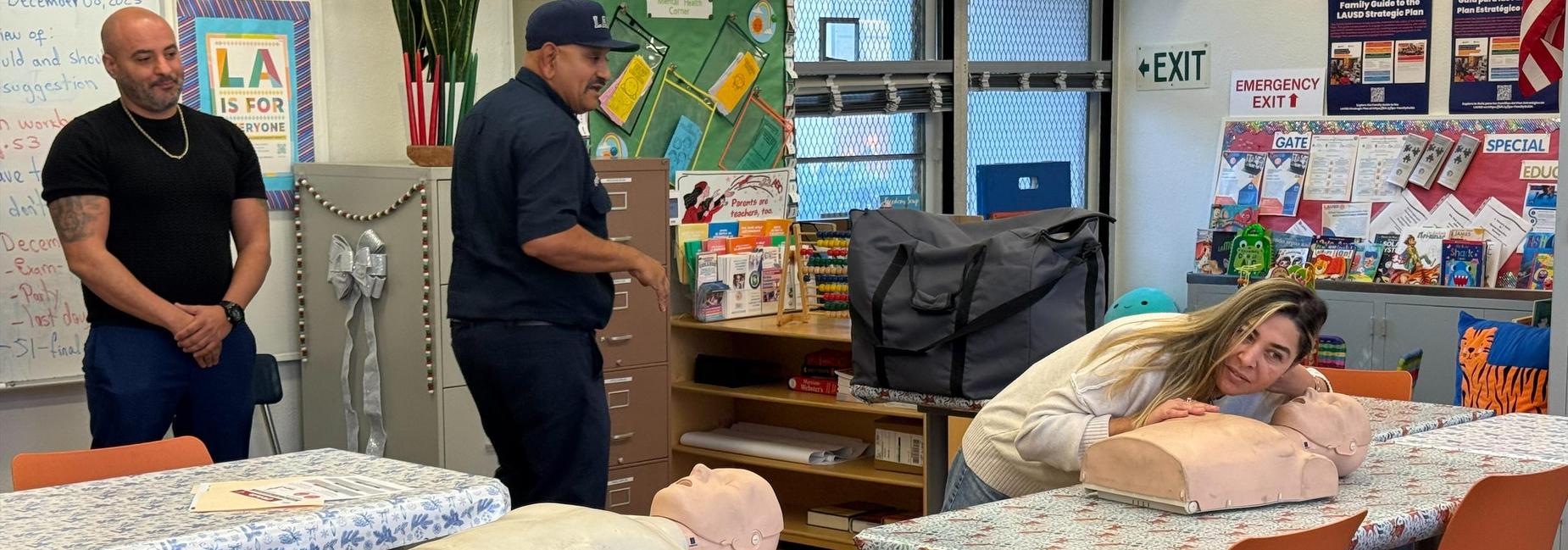 Parent learning CPR is parent workshop.