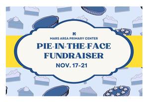 Pumpkin pies floating around a sign