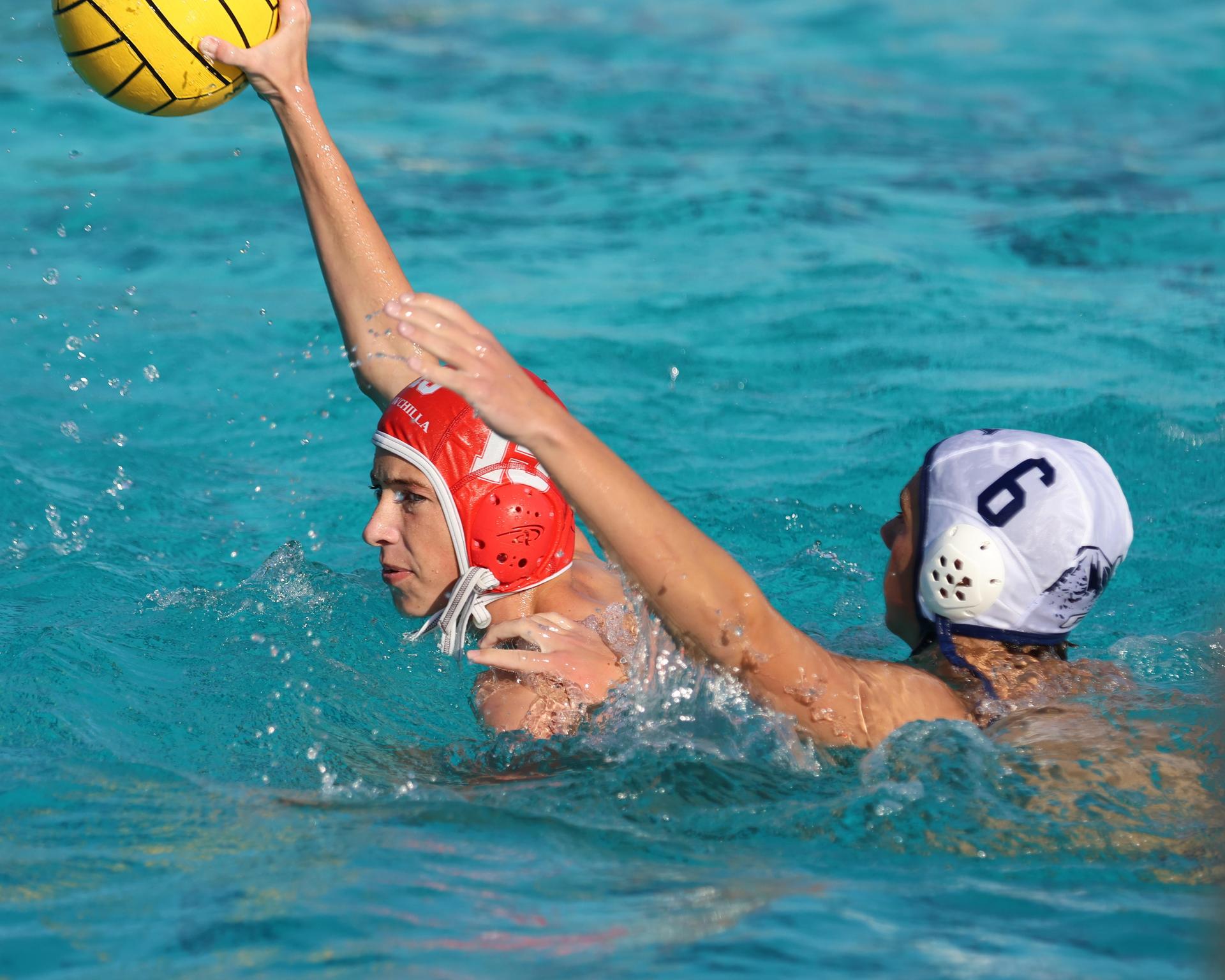 Boys playing water polo against Yosemite
