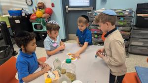 first grade boys play a game together