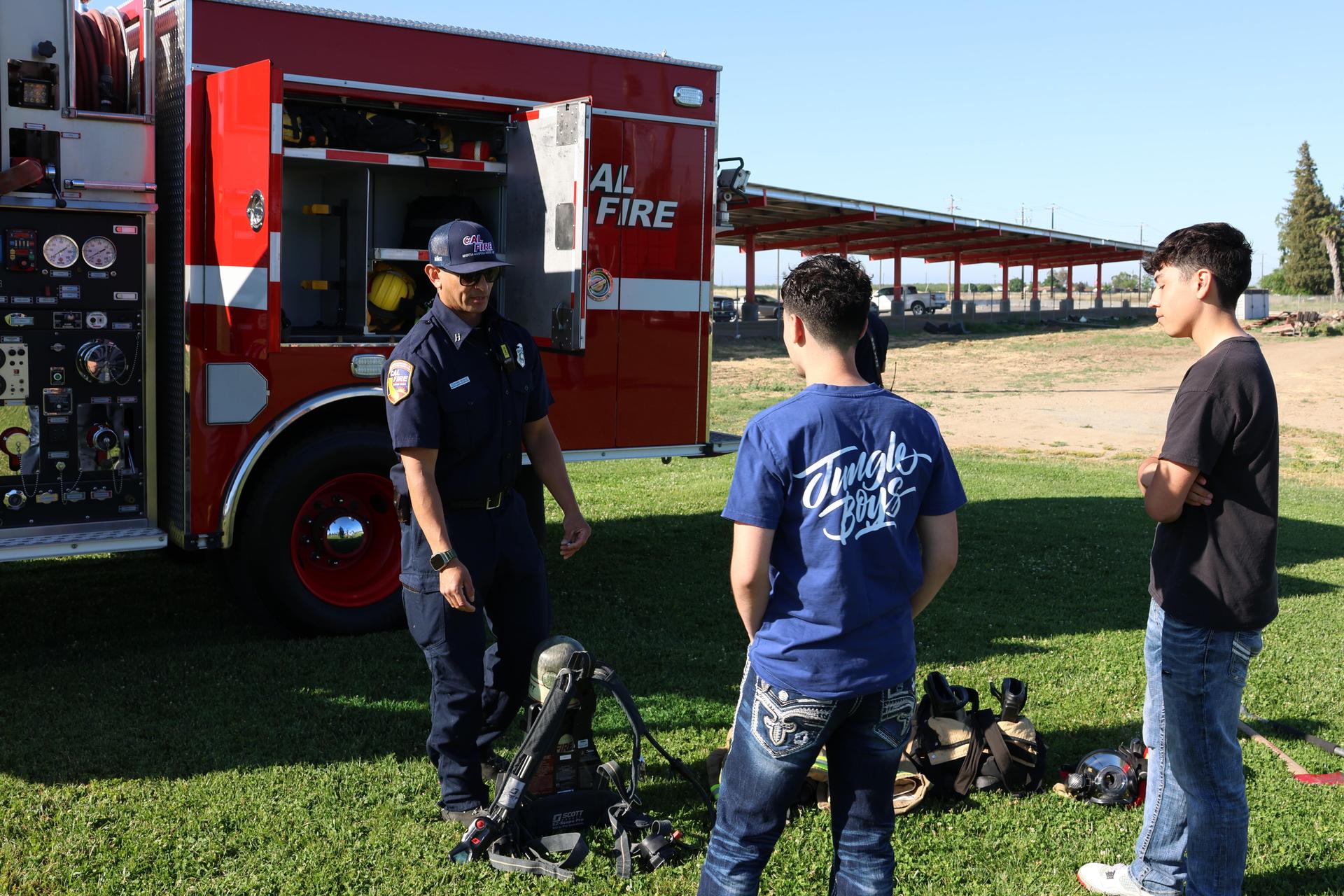 Firefighters speaking to students
