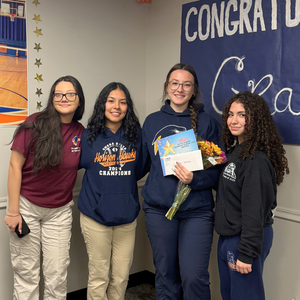 Gracie Griggs with three other students after being named INCS senior of the year