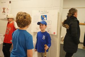 A student portrays Jackie Robinson at the wax museum.