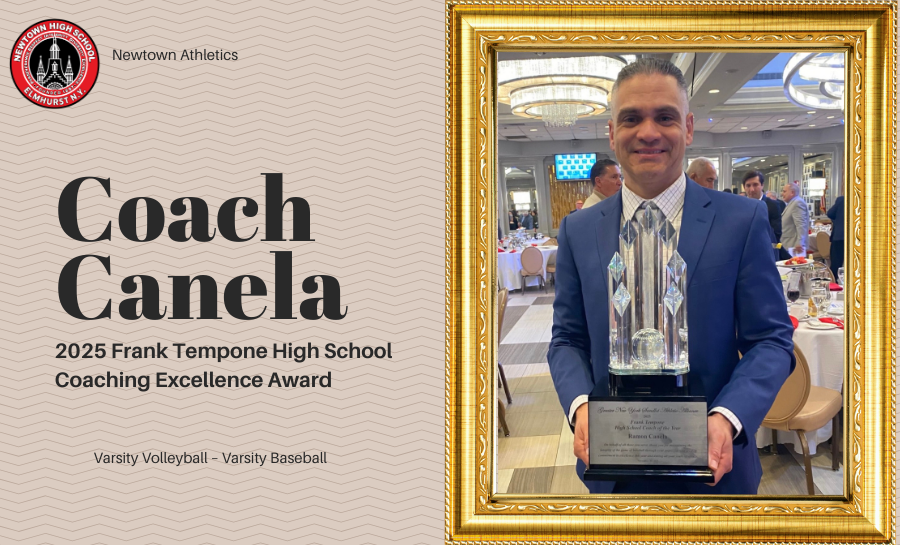 Image of coach Canela holding the trophy for his award.
