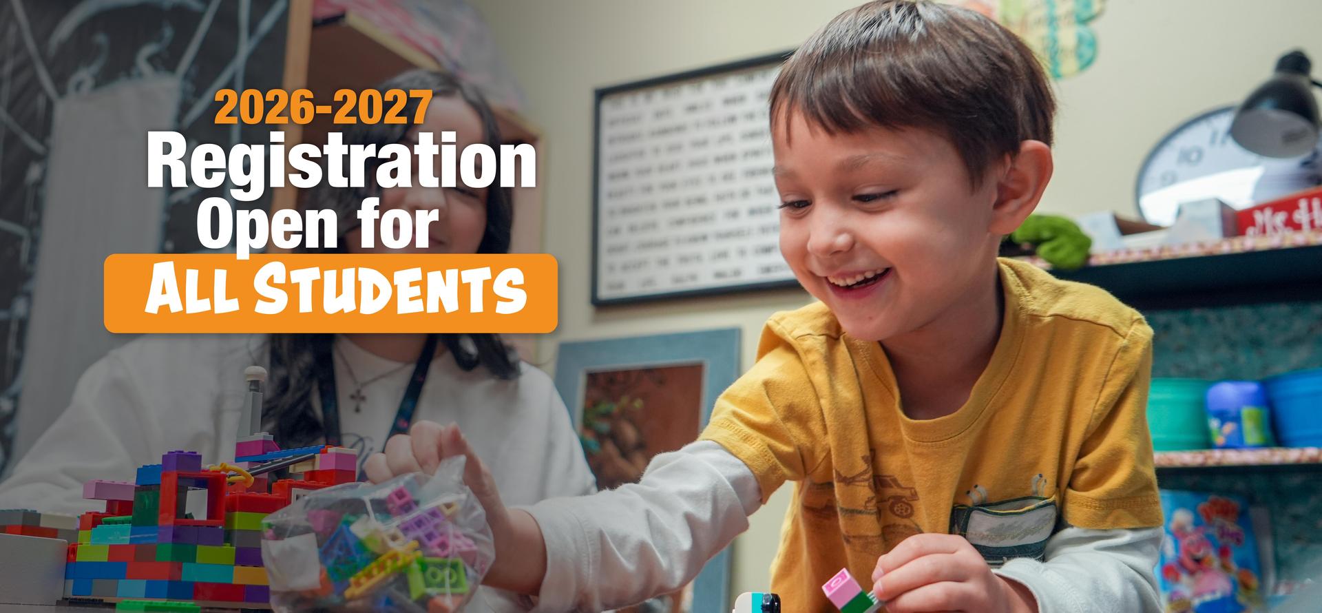 Young boy playing with colorful building blocks in a classroom setting.