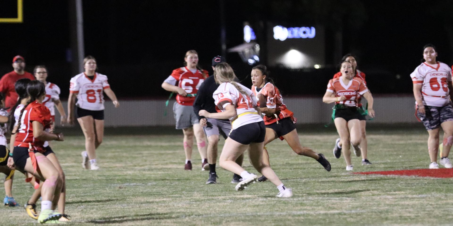 girls playing flag football