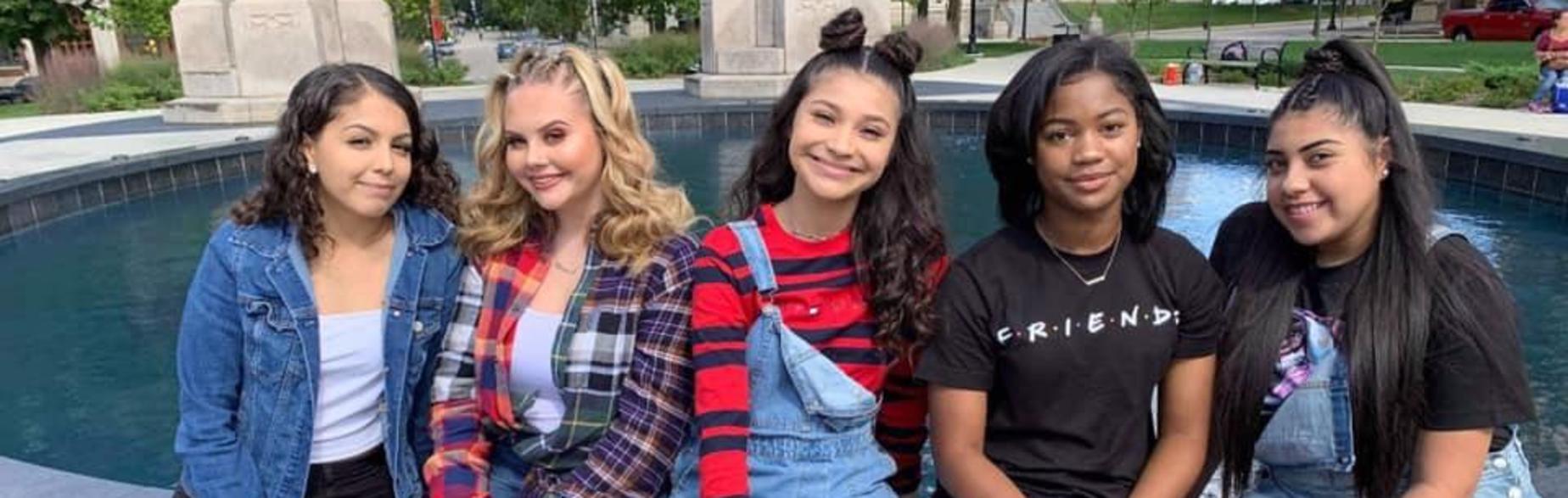 girls by fountain