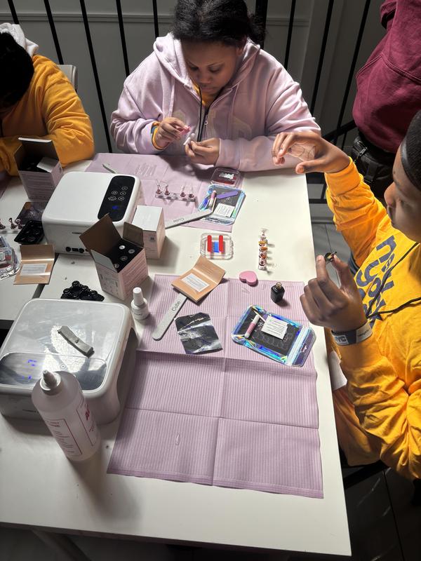 students creating their own custom nails