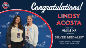 Smiling students with awards