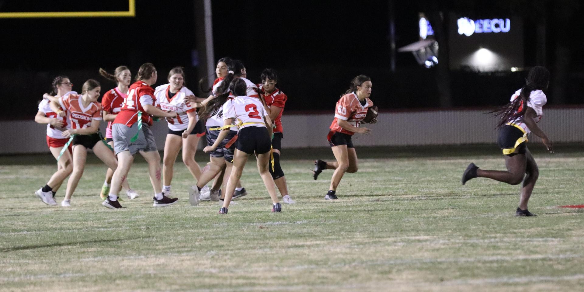girls playing flag football