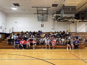 photo - MJH students pose for a photo in the gym during the 2025 United Way Day of Action