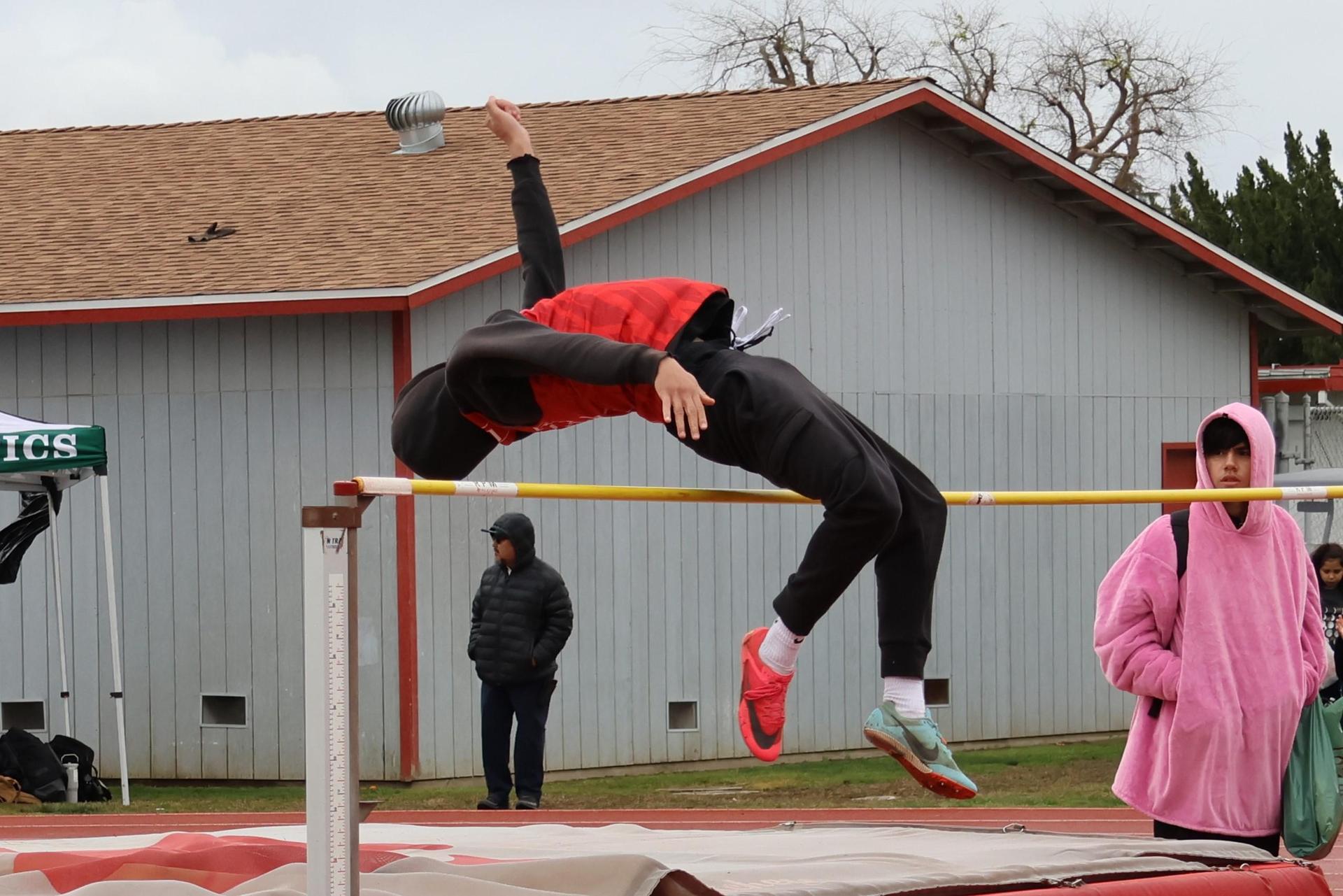 varsity boys high jumping