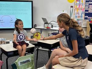 7th grade student working with Kindergarten student in friendship circles