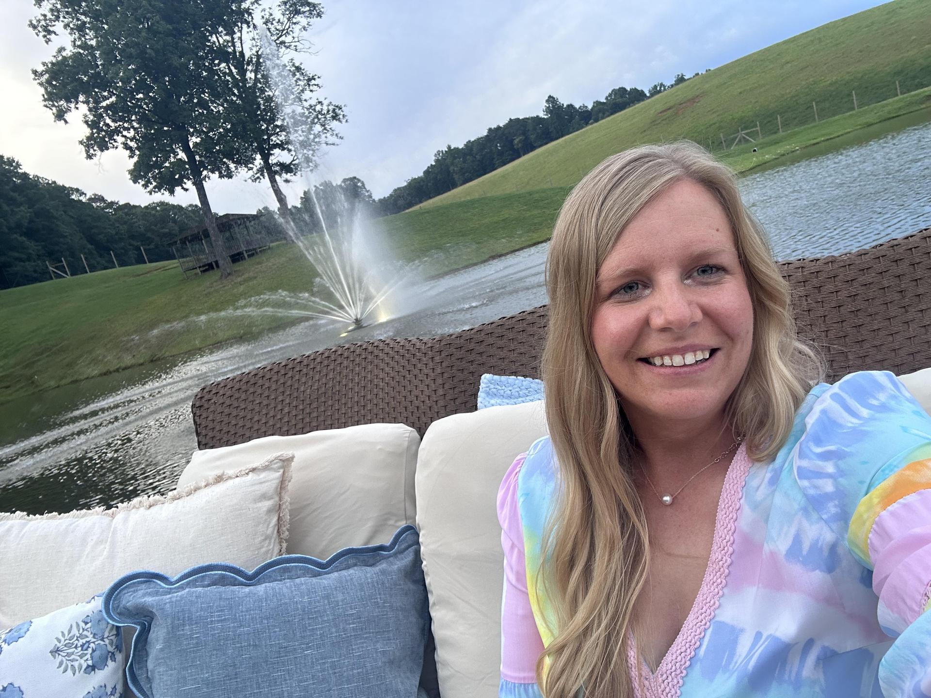 selfie in front of water fountain