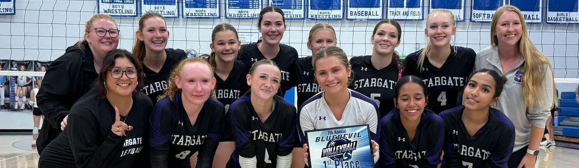 Stargate Volleyball team with winning trophy