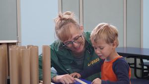 Child and parent playing
