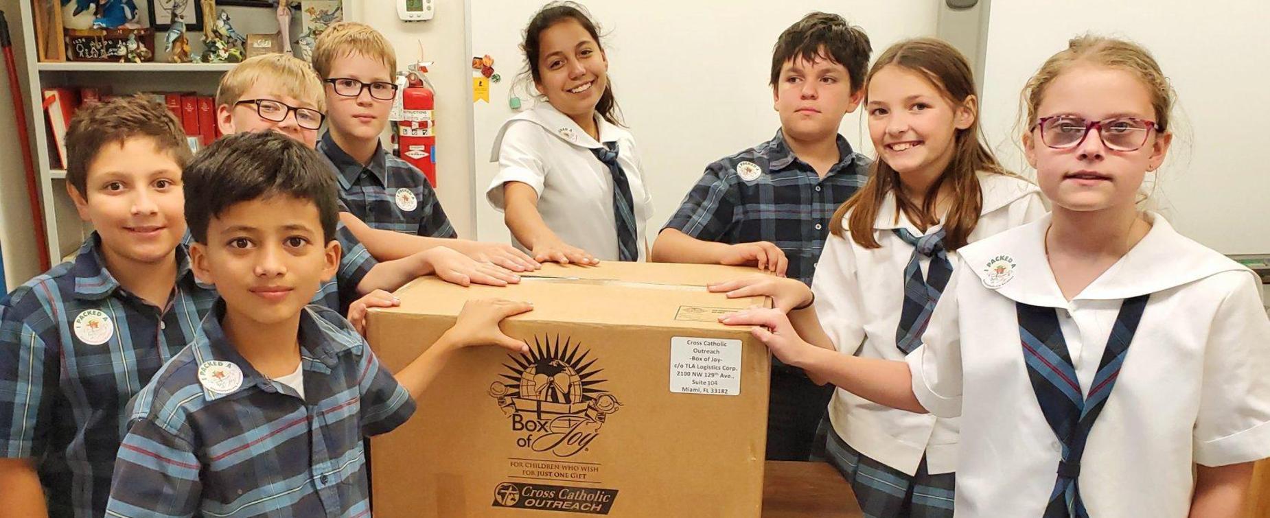 Students smiling with their service project