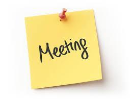 Yellow sticky note with the word meeting