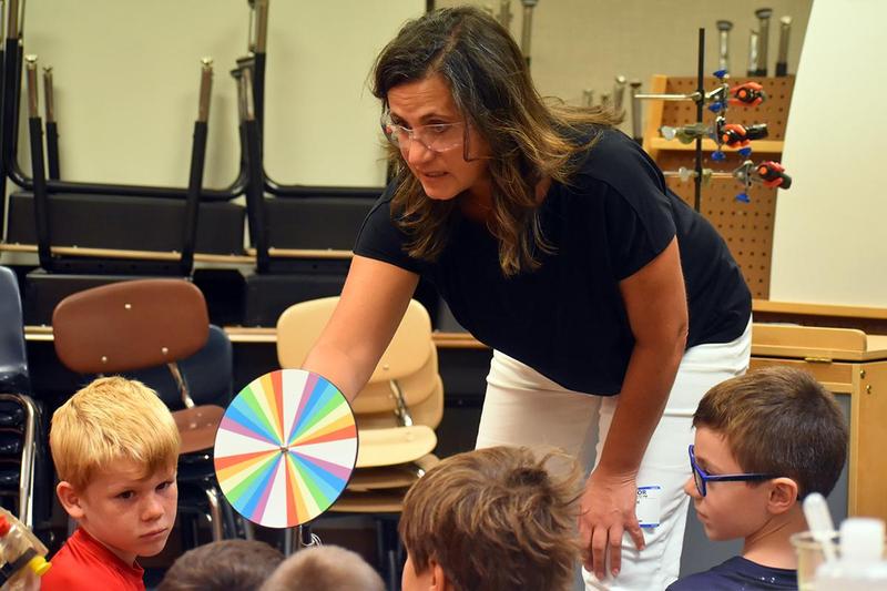 young students conducting science experiments