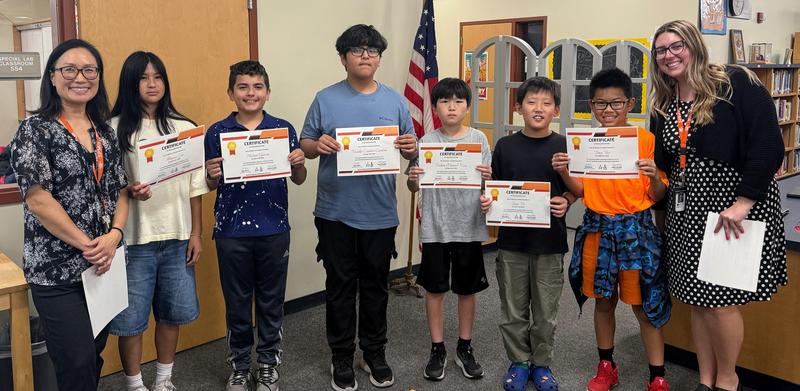 From left to right: Julie Ryu (Beginning ELD Teacher), Amara Lee, Matias Garcia, Nicolas Condori Cordoba, Yudam Daniel Lee, Eason Jin, Tony Tao, and Jessica Kammer (Intermediate ELD Teacher) celebrate students’ English language proficiency. (Photo Courtesy of South Pasadena Middle School)
