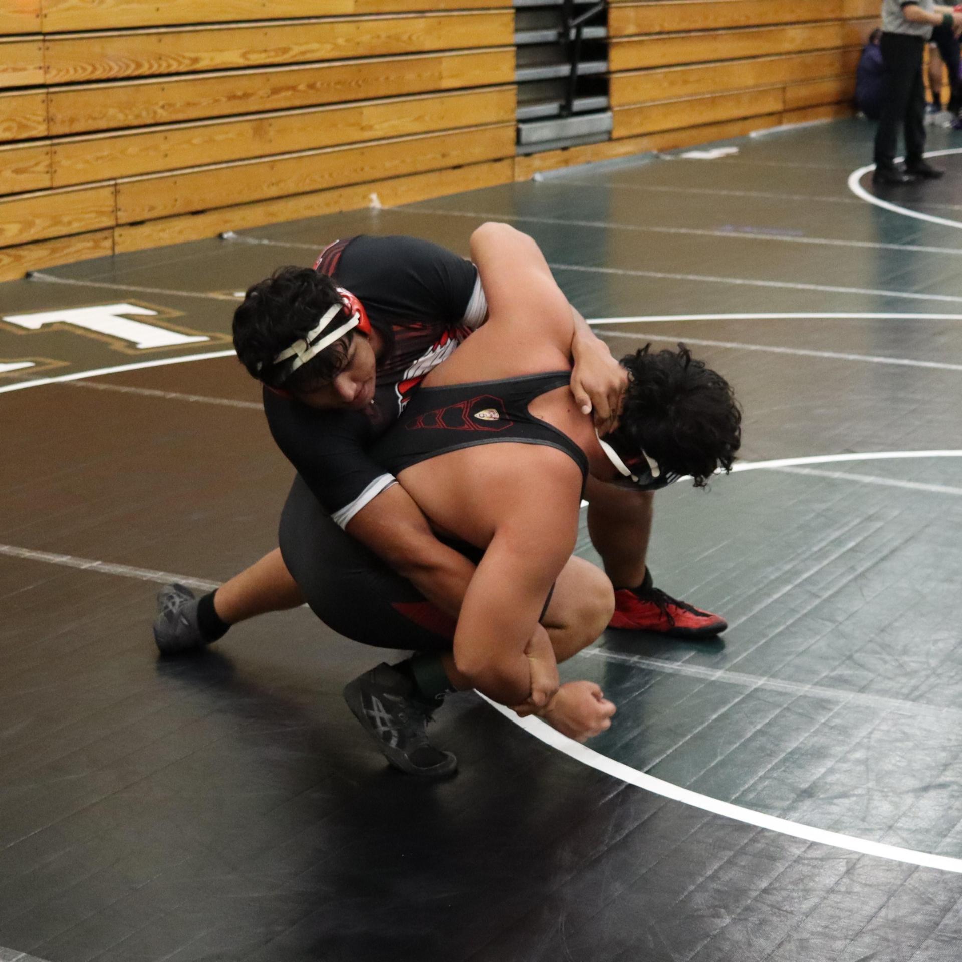 wrestlers in action at the Hawks invitational