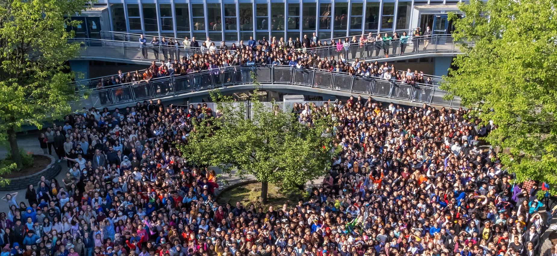 Photo of all staff and students in the Main Courtyard taken from the roof.