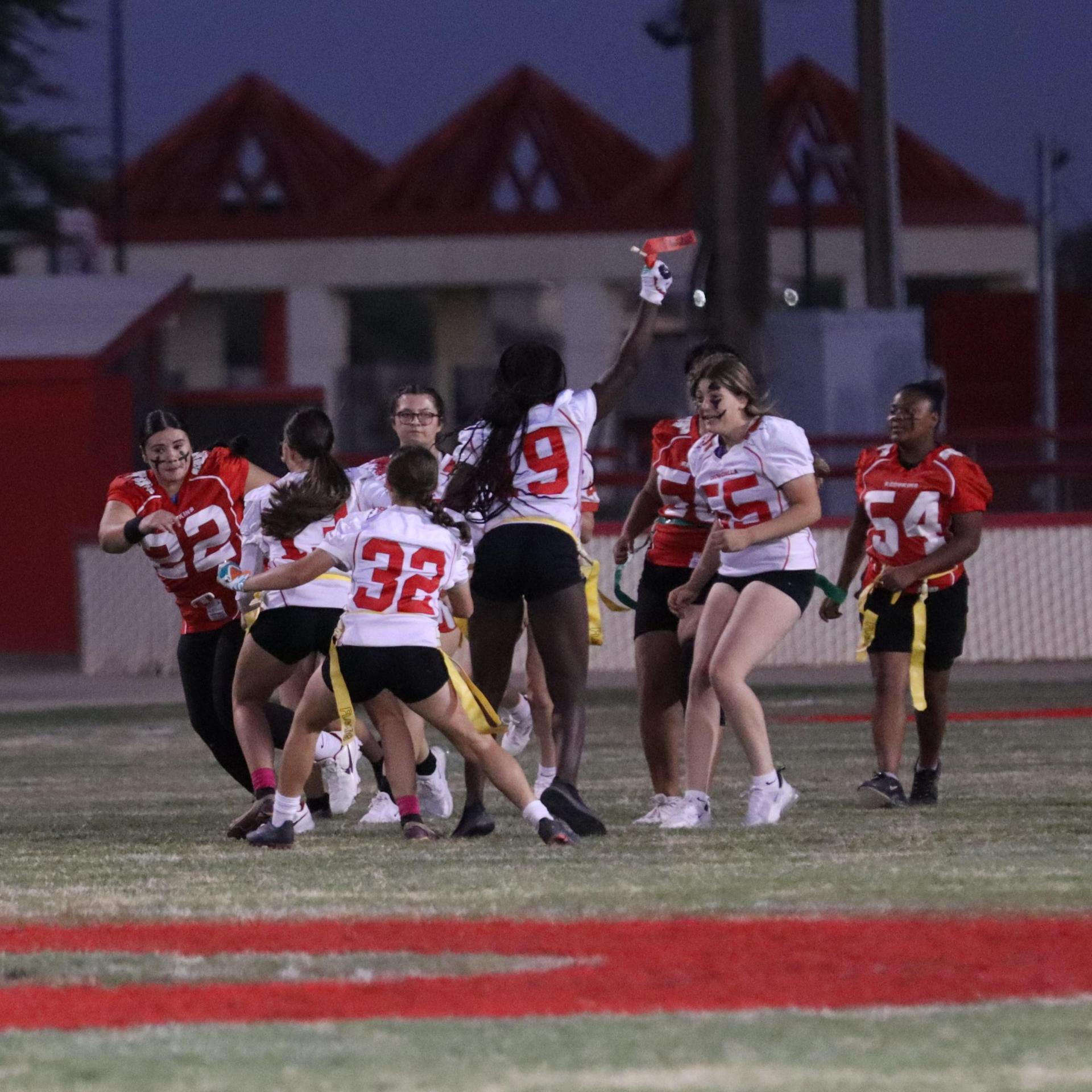 girls playing flag football