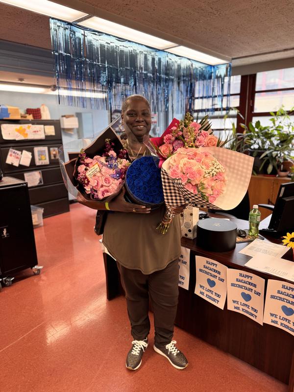 Ms. Khriscy with her flowers
