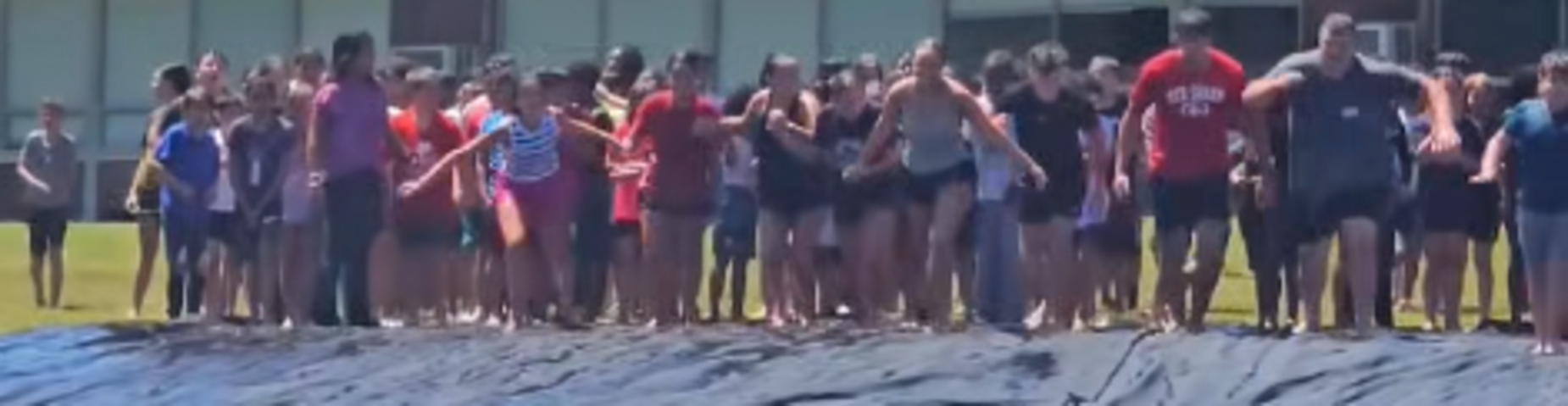 MES and MHS students get ready to slip and slide on Field Day!