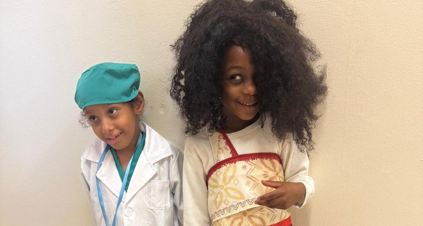Students dressed as a doctor and Disney Character Moana